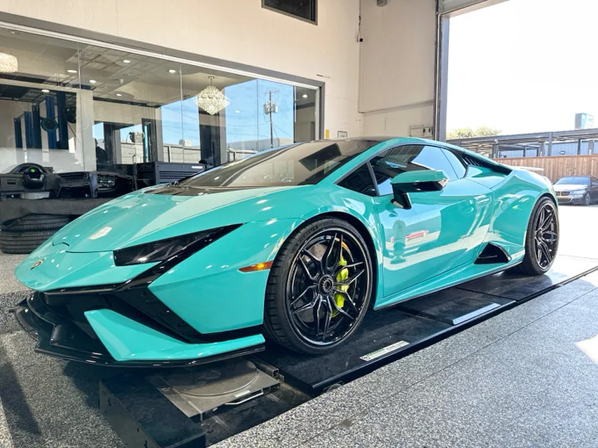 Teal Lamborghini Huracan inside the JP Euro auto repair shop in Garland, TX